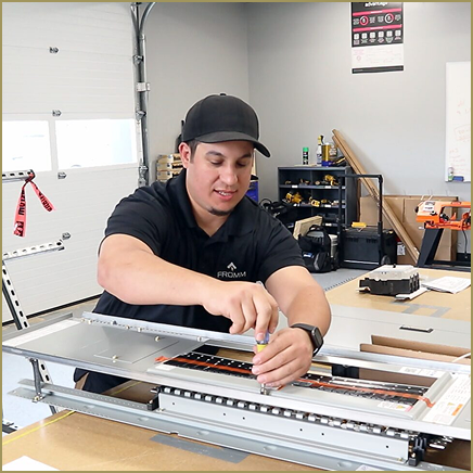 A FrommConnect employee assembling an Eaton Pow-R-Express electrical panelboard